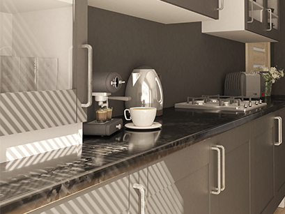 A contemporary kitchen in Bangalore showcasing a dark countertop, a textured backsplash, and kitchen essentials like a kettle.